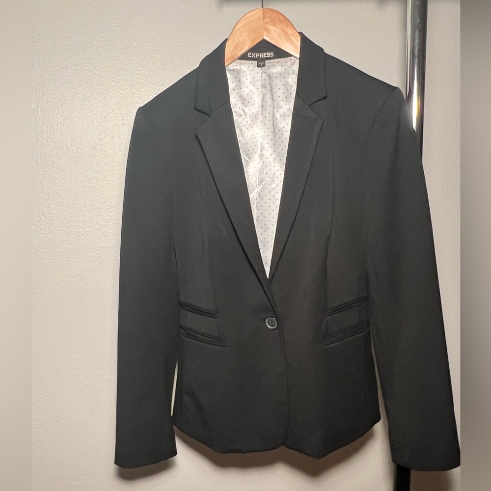 Express black blazer with polka-dotted interior lining. Two sizes available!